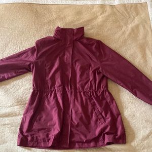 A New Day Maroon Size XL Water Resistant Rain Coat. Hood hidden in collar.